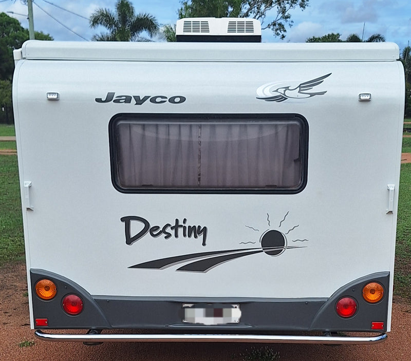 White Jayco Destiny travel trailer with visible branding and model name.